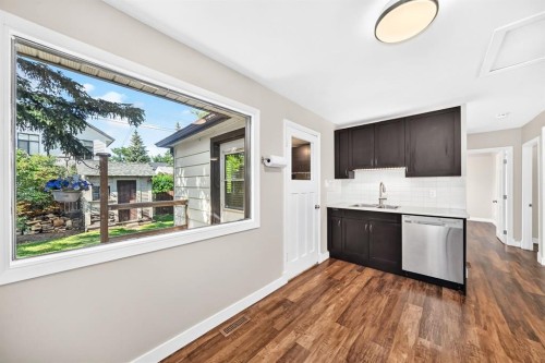 6012 33 Avenue Nw, Calgary, AB - Indoor Photo Showing Kitchen With Double Sink