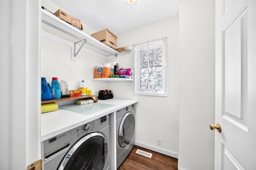 14954 Mt Mckenzie Drive Se, Calgary, AB - Indoor Photo Showing Laundry Room