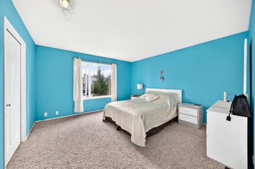 14954 Mt Mckenzie Drive Se, Calgary, AB - Indoor Photo Showing Bedroom