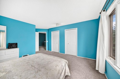 14954 Mt Mckenzie Drive Se, Calgary, AB - Indoor Photo Showing Bedroom
