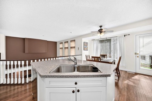 14954 Mt Mckenzie Drive Se, Calgary, AB - Indoor Photo Showing Kitchen With Double Sink