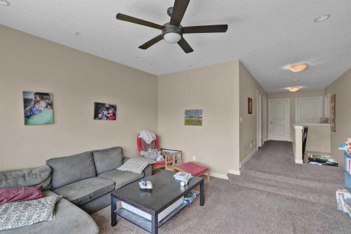 518 Mahogany Manor Se, Calgary, AB - Indoor Photo Showing Living Room