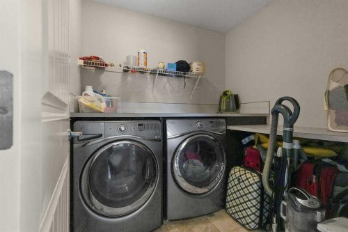 518 Mahogany Manor Se, Calgary, AB - Indoor Photo Showing Laundry Room