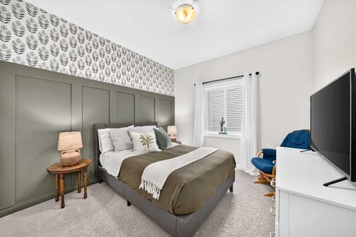 11 Westridge Way, Okotoks, AB - Indoor Photo Showing Bedroom