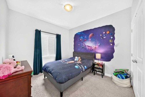 11 Westridge Way, Okotoks, AB - Indoor Photo Showing Bedroom