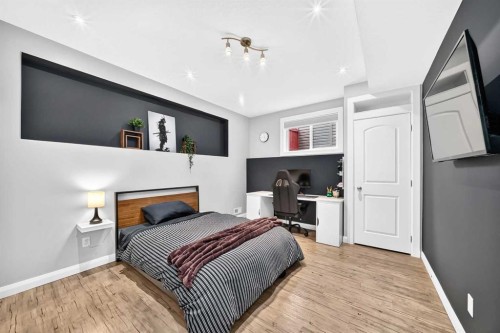 11 Westridge Way, Okotoks, AB - Indoor Photo Showing Bedroom