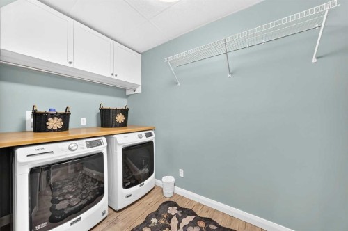 11 Westridge Way, Okotoks, AB - Indoor Photo Showing Laundry Room