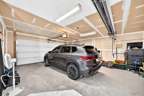 11 Westridge Way, Okotoks, AB - Indoor Photo Showing Garage