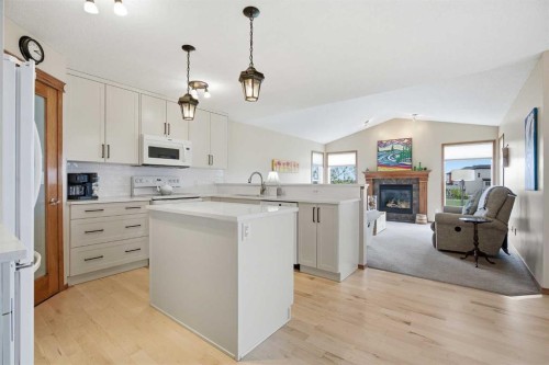 276 Kincora Heights Nw, Calgary, AB - Indoor Photo Showing Kitchen With Fireplace With Upgraded Kitchen