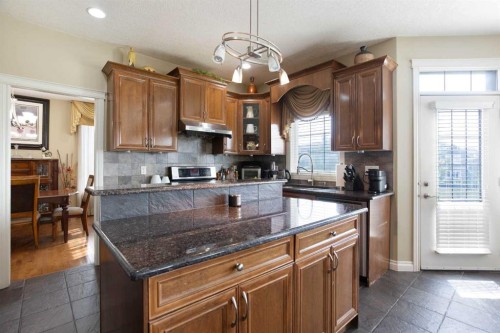 1149 Channelside Drive Sw, Airdrie, AB - Indoor Photo Showing Kitchen