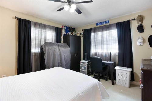 1149 Channelside Drive Sw, Airdrie, AB - Indoor Photo Showing Bedroom