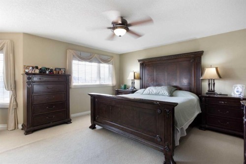 1149 Channelside Drive Sw, Airdrie, AB - Indoor Photo Showing Bedroom