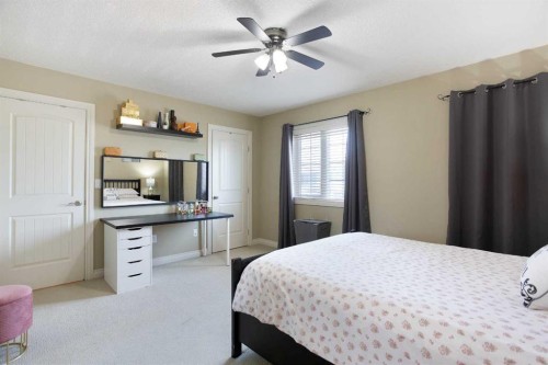 1149 Channelside Drive Sw, Airdrie, AB - Indoor Photo Showing Bedroom