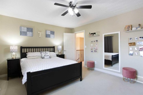 1149 Channelside Drive Sw, Airdrie, AB - Indoor Photo Showing Bedroom