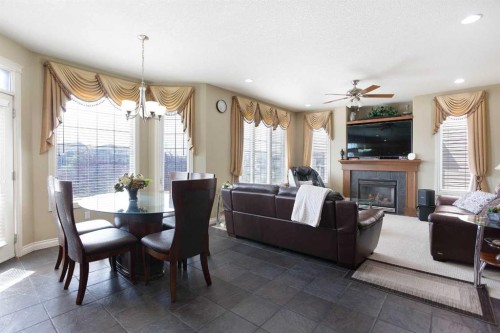 1149 Channelside Drive Sw, Airdrie, AB - Indoor With Fireplace