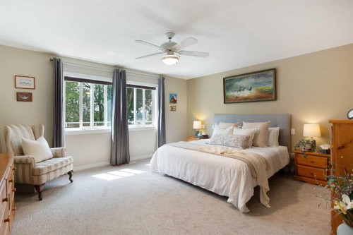 128 Waterstone Place Se, Airdrie, AB - Indoor Photo Showing Bedroom