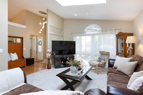 128 Waterstone Place Se, Airdrie, AB - Indoor Photo Showing Living Room