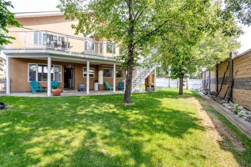 128 Waterstone Place Se, Airdrie, AB - Outdoor With Deck Patio Veranda