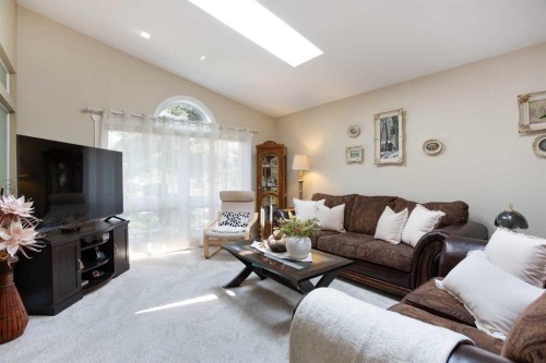 128 Waterstone Place Se, Airdrie, AB - Indoor Photo Showing Living Room