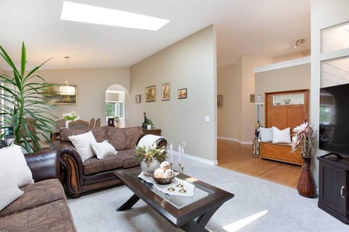 128 Waterstone Place Se, Airdrie, AB - Indoor Photo Showing Living Room