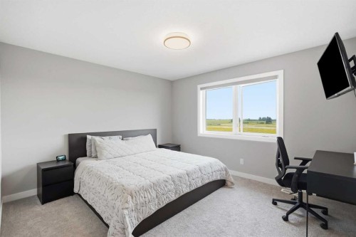 143 Belvedere Crescent Se, Calgary, AB - Indoor Photo Showing Bedroom