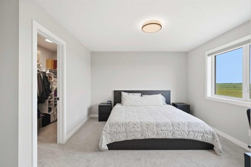 143 Belvedere Crescent Se, Calgary, AB - Indoor Photo Showing Bedroom