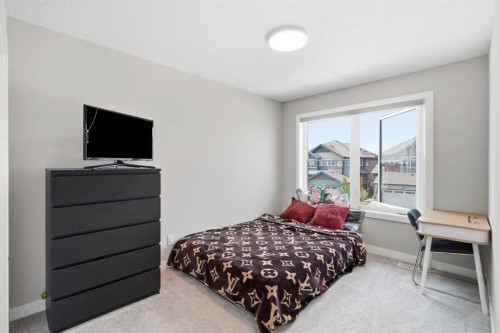 143 Belvedere Crescent Se, Calgary, AB - Indoor Photo Showing Bedroom
