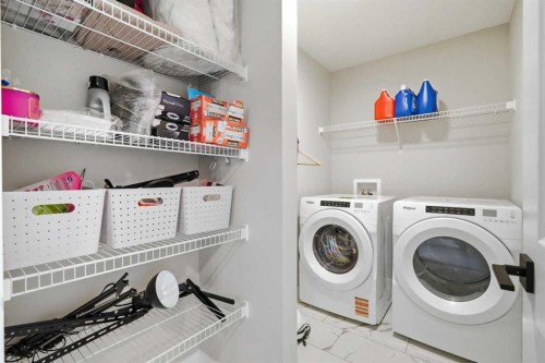 143 Belvedere Crescent Se, Calgary, AB - Indoor Photo Showing Laundry Room