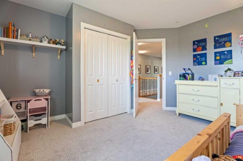 7 Crystal Green Way, Okotoks, AB - Indoor Photo Showing Bedroom