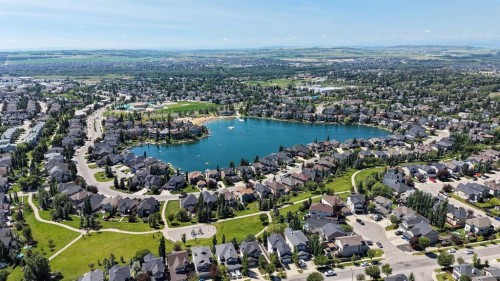 7 Crystal Green Way, Okotoks, AB - Outdoor With Body Of Water With View