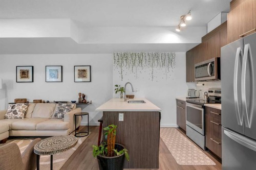236-300 Marina Drive, Chestermere, AB - Indoor Photo Showing Kitchen With Stainless Steel Kitchen