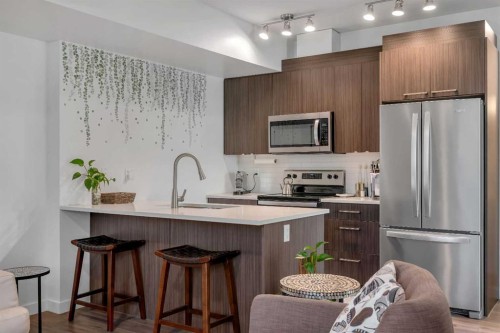 236-300 Marina Drive, Chestermere, AB - Indoor Photo Showing Kitchen With Stainless Steel Kitchen With Upgraded Kitchen