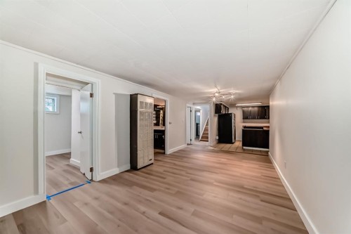 404 Acacia Drive Se, Airdrie, AB - Indoor Photo Showing Other Room