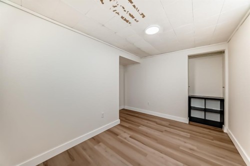 404 Acacia Drive Se, Airdrie, AB - Indoor Photo Showing Other Room