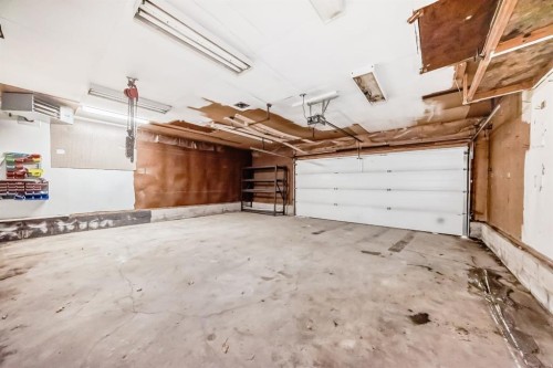 404 Acacia Drive Se, Airdrie, AB - Indoor Photo Showing Garage