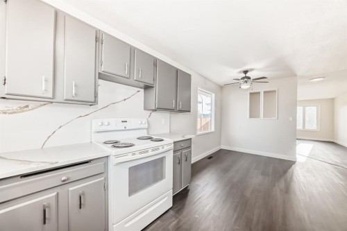 404 Acacia Drive Se, Airdrie, AB - Indoor Photo Showing Kitchen
