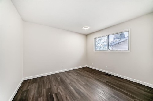 404 Acacia Drive Se, Airdrie, AB - Indoor Photo Showing Other Room