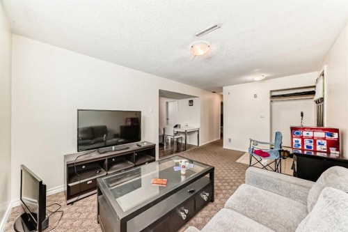 4004 7 Avenue Sw, Calgary, AB - Indoor Photo Showing Living Room