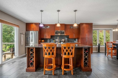34 Cascade Place, Cochrane, AB - Indoor Photo Showing Kitchen With Upgraded Kitchen