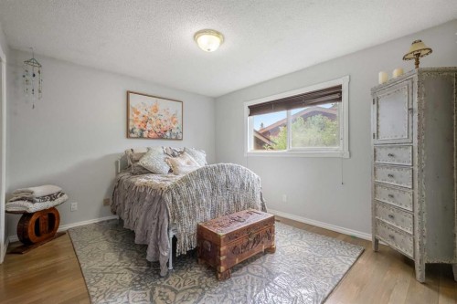 34 Cascade Place, Cochrane, AB - Indoor Photo Showing Bedroom