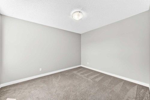 176 Savanna Lane Ne, Calgary, AB - Indoor Photo Showing Other Room