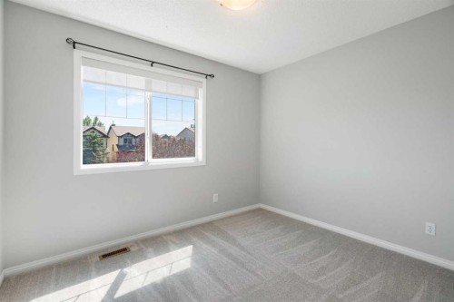 128 Silverado Way Sw, Calgary, AB - Indoor Photo Showing Other Room