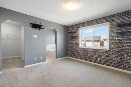 128 Silverado Way Sw, Calgary, AB - Indoor Photo Showing Other Room