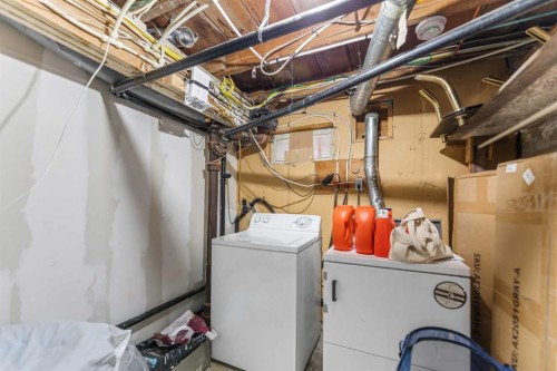 1407 28 Street Sw, Calgary, AB - Indoor Photo Showing Laundry Room