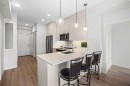 2403-76 Cornerstone Passage Ne, Calgary, AB  - Indoor Photo Showing Kitchen With Double Sink With Upgraded Kitchen 
