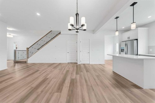 834 Bayview Terrace Sw, Airdrie, AB - Indoor Photo Showing Kitchen With Upgraded Kitchen