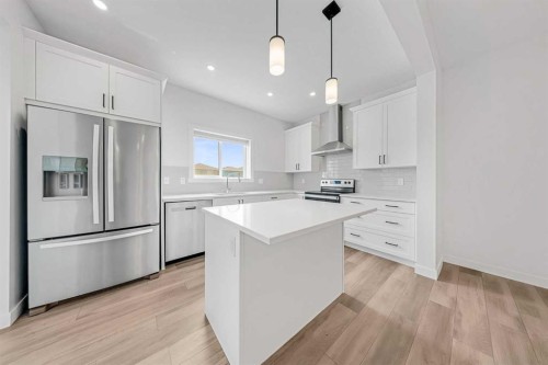 834 Bayview Terrace Sw, Airdrie, AB - Indoor Photo Showing Kitchen With Stainless Steel Kitchen With Upgraded Kitchen