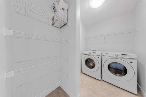 834 Bayview Terrace Sw, Airdrie, AB - Indoor Photo Showing Laundry Room