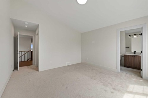52 Patterson Rise Sw, Calgary, AB - Indoor Photo Showing Other Room