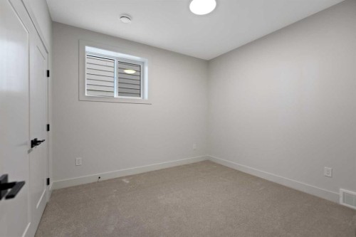 52 Patterson Rise Sw, Calgary, AB - Indoor Photo Showing Other Room
